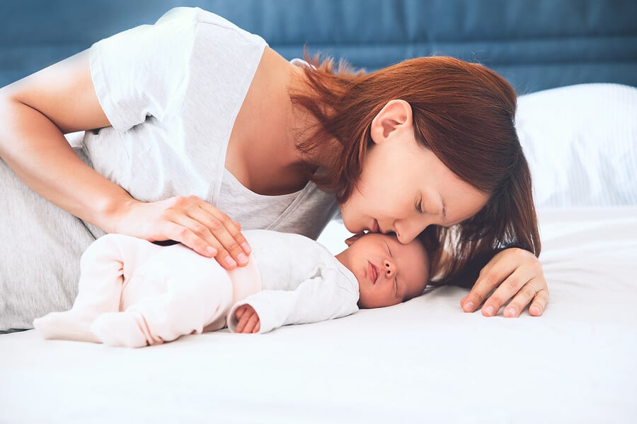 Compliance with FMLA featuring a mother and newborn